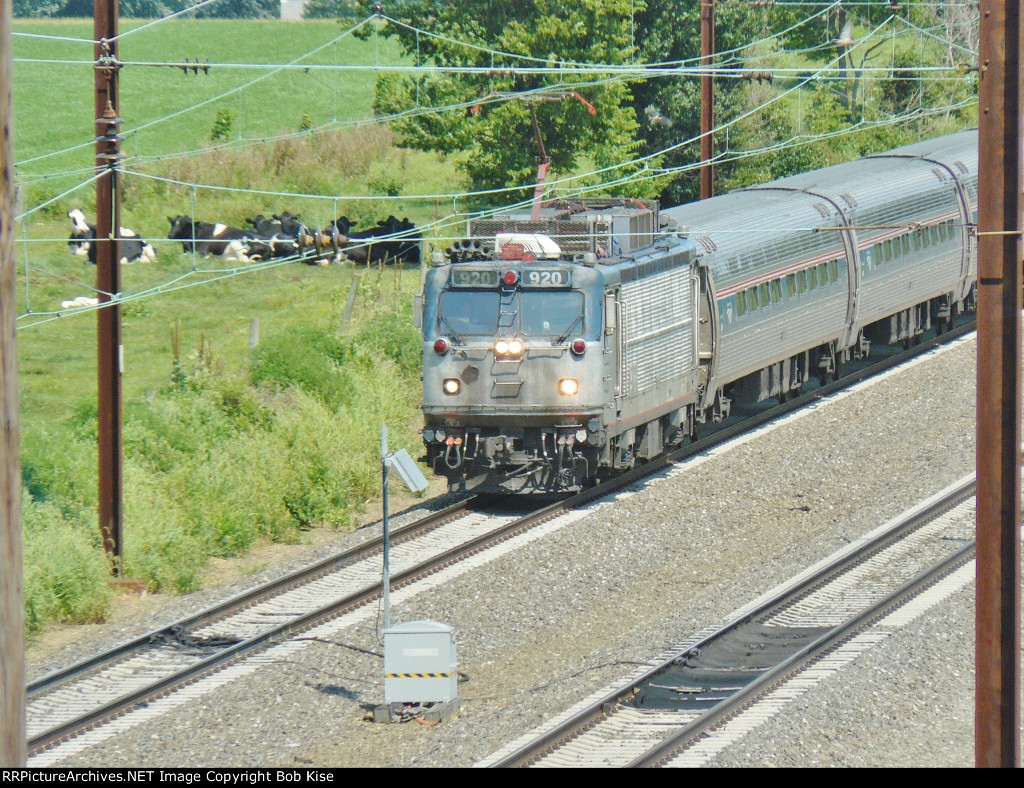 AEM7 920 leads Train 645 toward Lancaster, running about 10 minutes